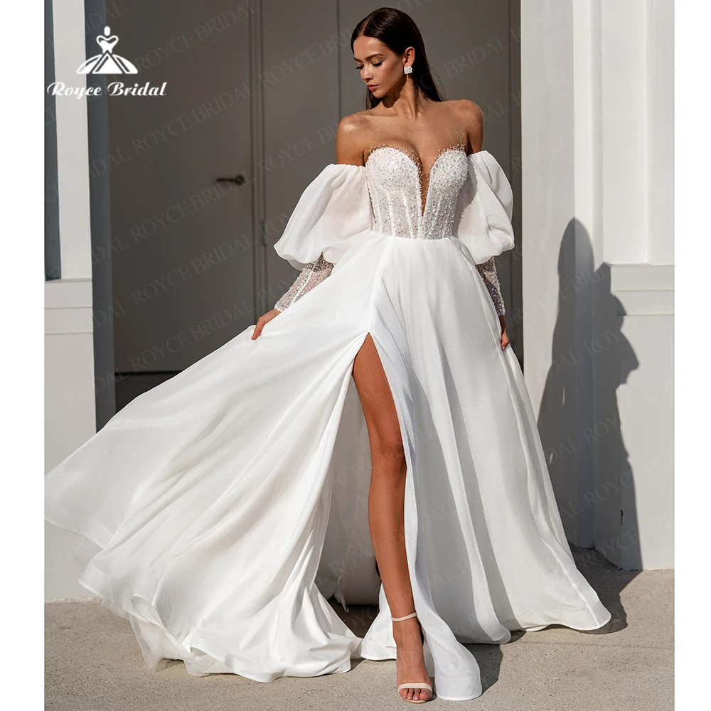 Sexy Off Shoulder Beads Summer Wedding Dress with Long Sleeves 2024 Wedding Gown robe mariage femme Roycebridal
Sexy Off Shoulder Beads Summer Wedding Dress with Long Sleeves 2024 Wedding Gown robe mariage femme Roycebridal