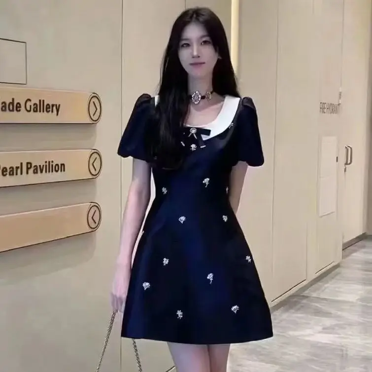 Элегантное мини-платье с бантом и бусинами
Элегантное мини-платье с бантом и бусинами