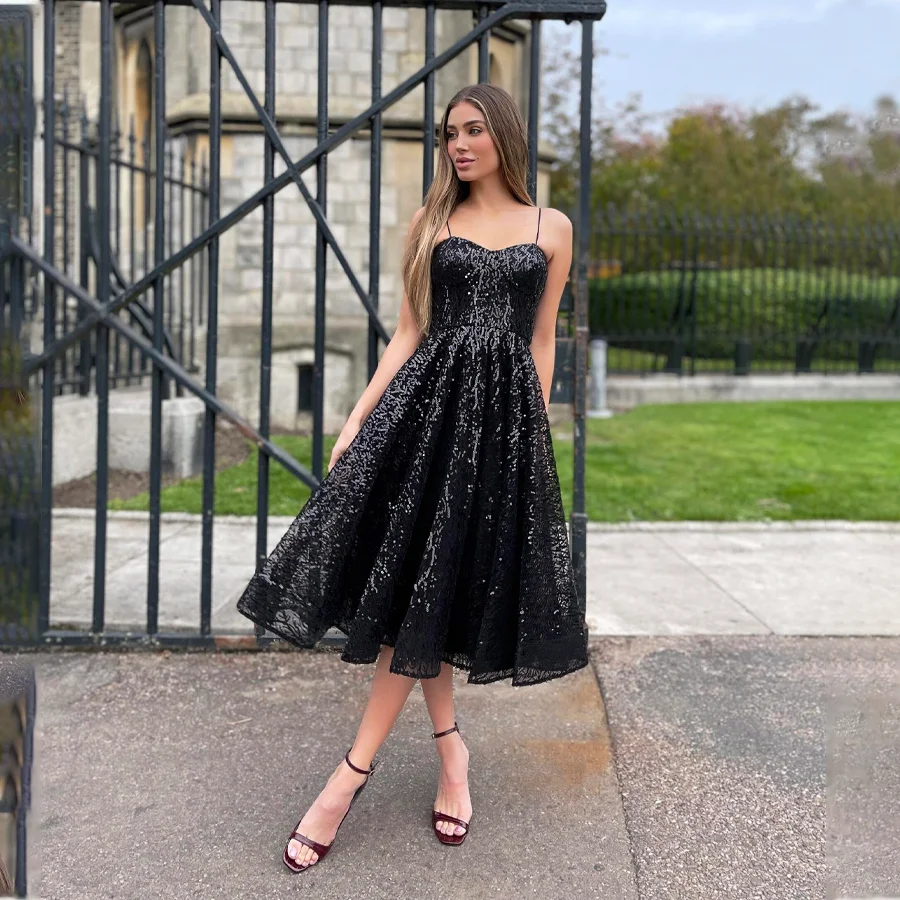 

Sparkling Sequin Prom Dress with Spaghetti Straps Elegant Black Tea-Length Evening Gown for Special Occasions