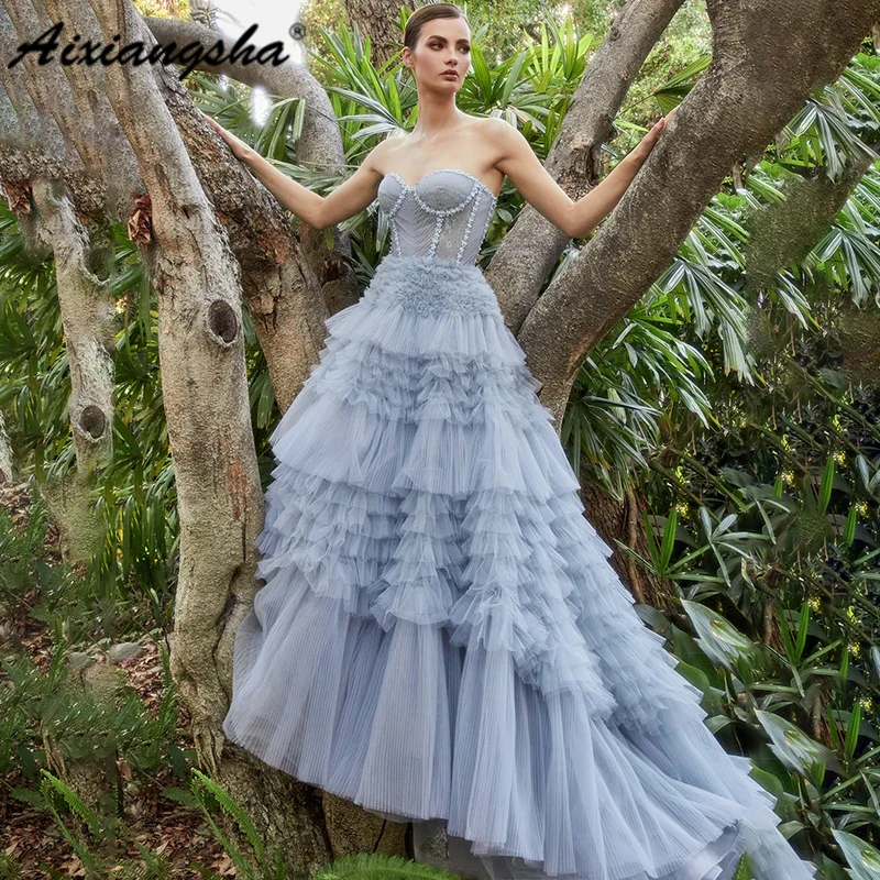 Aixiangsha Princess Gown Features Beautiful Pleated Corset Bodice Blossom Details Adjustable Tie-back Ruffle Tulle Ball Gown
Aixiangsha Princess Gown Features Beautiful Pleated Corset Bodice Blossom Details Adjustable Tie-back Ruffle Tulle Ball Gown