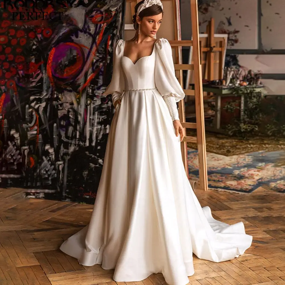 PERFECT Elegant Sweetheart A-Line Wedding Dresses Backless Long Sleeves Beaded Satin Bridal Gowns Custom Made Robe De Mariée
PERFECT Elegant Sweetheart A-Line Wedding Dresses Backless Long Sleeves Beaded Satin Bridal Gowns Custom Made Robe De Mariée
