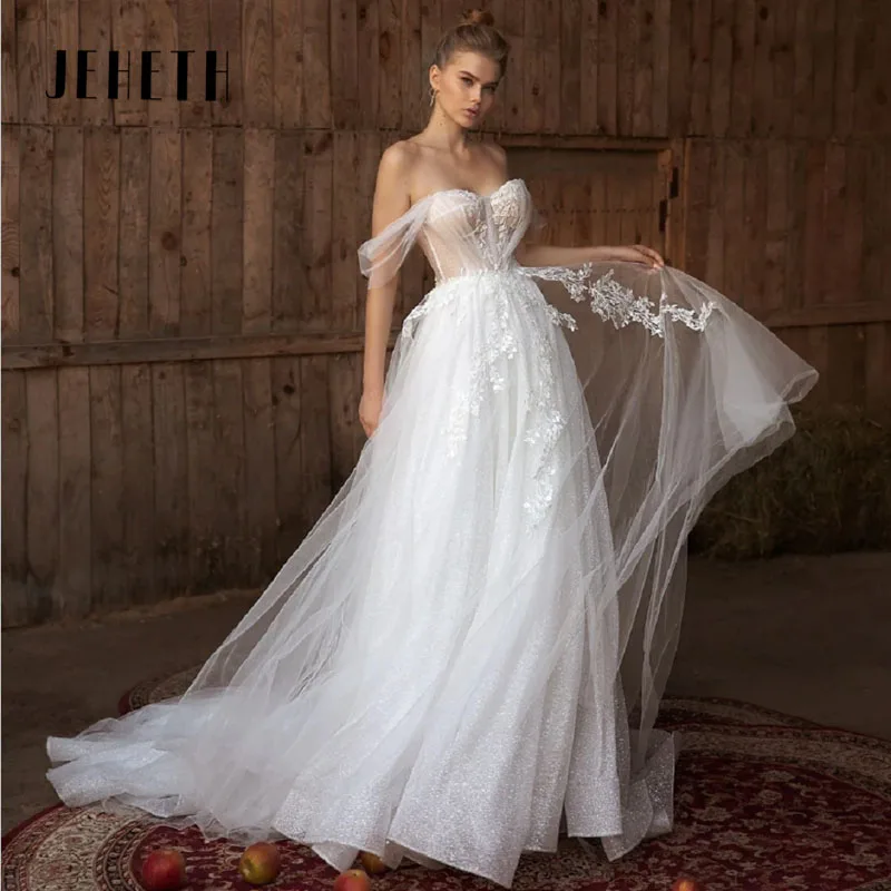 JEHETH Sweetheart Beach Boho Wedding Dresses For Women Lace Appliques Off The Shoulder Bridal Gowns Tulle Sexy Backless A-Line
JEHETH Sweetheart Beach Boho Wedding Dresses For Women Lace Appliques Off The Shoulder Bridal Gowns Tulle Sexy Backless A-Line
