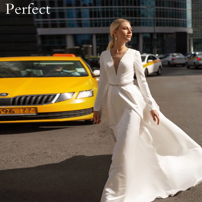 Perfect Simple Elegant A Line Satin Wedding Dress Long Sleeve V Neck Button Back Sequined Belt Court Train Robe De Mariee
Perfect Simple Elegant A Line Satin Wedding Dress Long Sleeve V Neck Button Back Sequined Belt Court Train Robe De Mariee