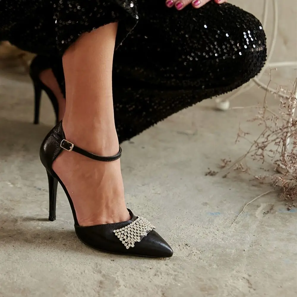 Eles Inner Outer Genuine Leather Thin High Heels Crown Stone Buckle Stiletto Poshnmore Gold Silver Black Hologram Heeled Shoes
Eles Inner Outer Genuine Leather Thin High Heels Crown Stone Buckle Stiletto Poshnmore Gold Silver Black Hologram Heeled Shoes