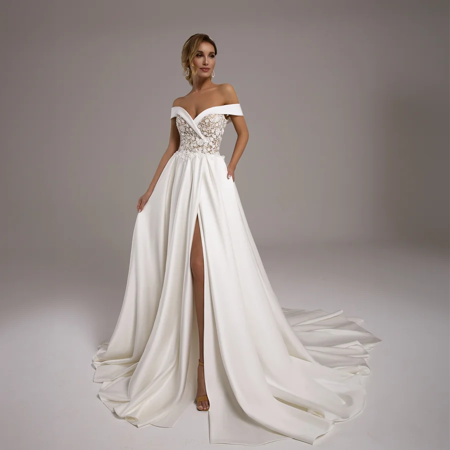Captivating Satin Wedding Dress Features Off-the-Shoulder Straps And Pocket Dramatic Applique Bridal Gown with High-Split Design
Captivating Satin Wedding Dress Features Off-the-Shoulder Straps And Pocket Dramatic Applique Bridal Gown with High-Split Design
