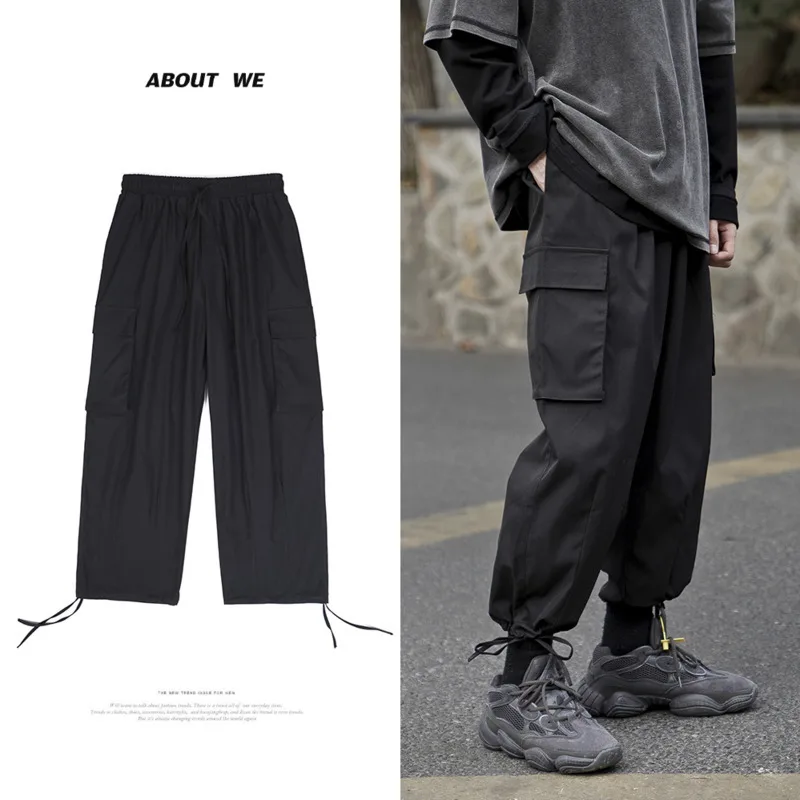Drawstring Casual Pants Men's Fashion Solid Color Multi-pocket Overalls Men Streetwear Wild Loose Hip Hop Cargo Trousers Mens
Drawstring Casual Pants Men's Fashion Solid Color Multi-pocket Overalls Men Streetwear Wild Loose Hip Hop Cargo Trousers Mens