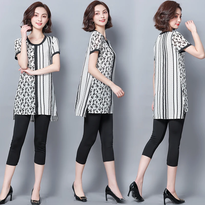 2020 summer large size color block printing and splicing wo piece set top and pants two piece set summer outfits for women
2020 summer large size color block printing and splicing wo piece set top and pants two piece set summer outfits for women
