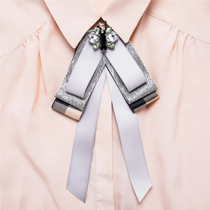 Free shipping new fashion Korean female Europe United States big-name long bow tie with diamond retro brooch white shirt school
Free shipping new fashion Korean female Europe United States big-name long bow tie with diamond retro brooch white shirt school