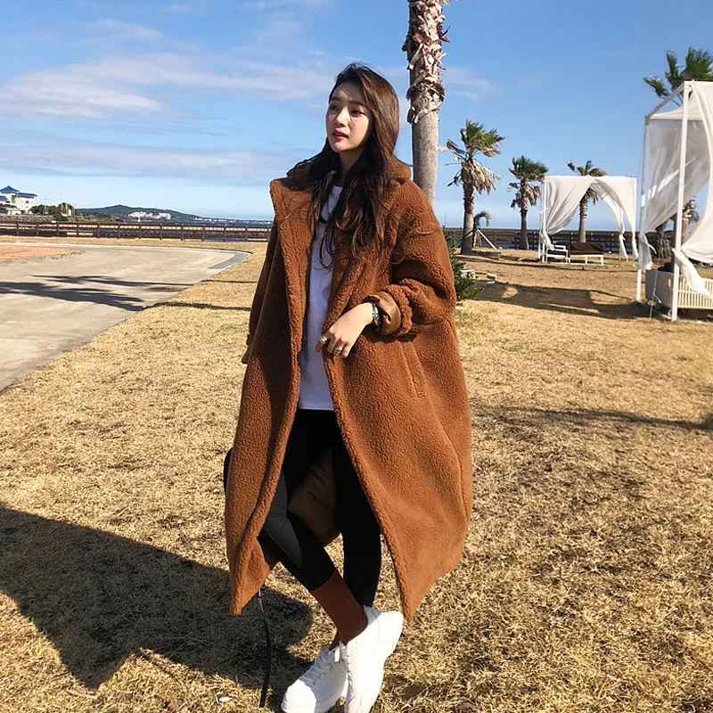 Winter coat ladies long sleeve button luxury wool coat sheep shearing fur one loose long fur plush warm coat jacket 2019 new
Winter coat ladies long sleeve button luxury wool coat sheep shearing fur one loose long fur plush warm coat jacket 2019 new