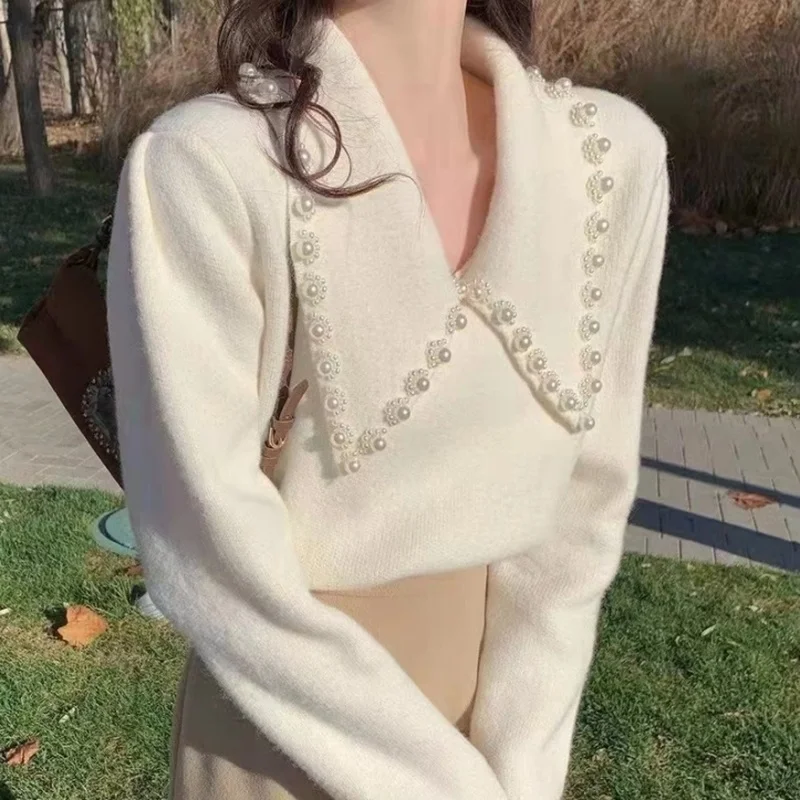 French Retro Long-sleeved POLO Collar Pearl Small Fragrance Sweater Women Autumn 2023 New Loose And Thin Sweater
French Retro Long-sleeved POLO Collar Pearl Small Fragrance Sweater Women Autumn 2023 New Loose And Thin Sweater