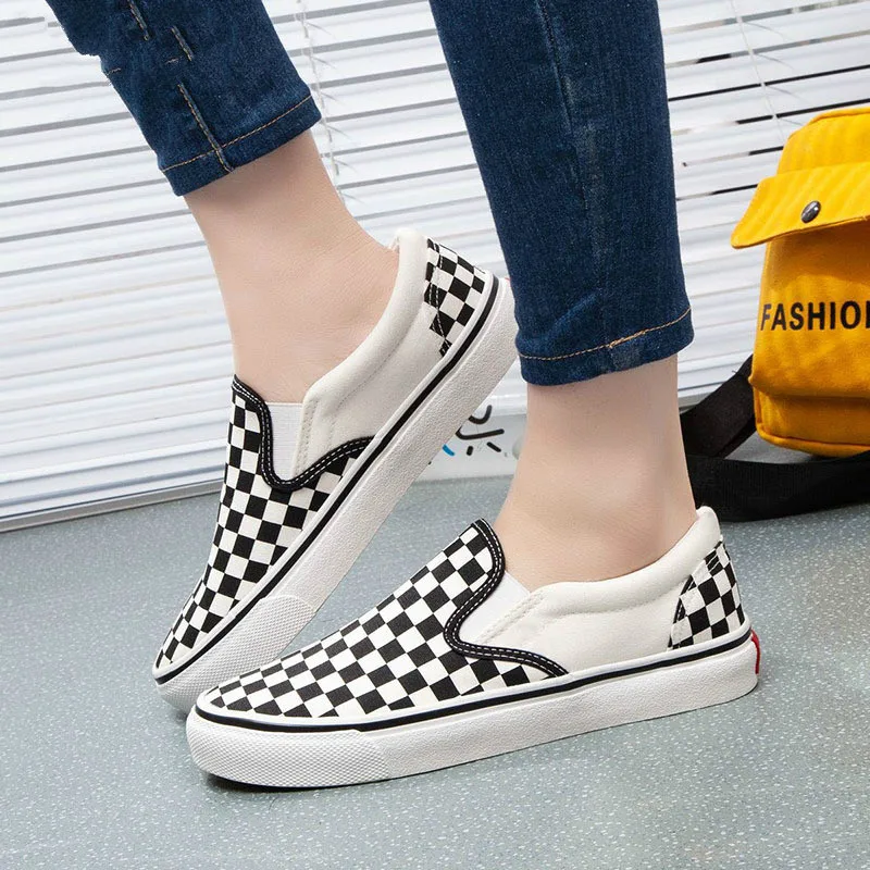 New Women's shoes black white plaid loafers lazy casual flat bottom foot canvas shoes platform sneakers Vulcanized Shoes
New Women's shoes black white plaid loafers lazy casual flat bottom foot canvas shoes platform sneakers Vulcanized Shoes