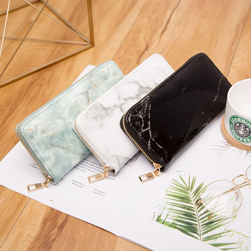 2019 hot sale new lacquered marble pattern change hand holding high-end personalized casual fashion wallet
2019 hot sale new lacquered marble pattern change hand holding high-end personalized casual fashion wallet
