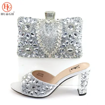 Luxury Sliver Color African Women Party Shoes and Bag Set Sexy High Heels Sandals IN Italy Decorated with Rhinestone Design Shoe
Luxury Sliver Color African Women Party Shoes and Bag Set Sexy High Heels Sandals IN Italy Decorated with Rhinestone Design Shoe