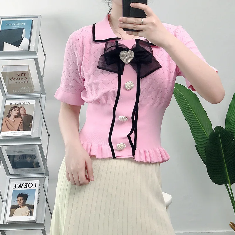 Knitted Pearls Button Up Shirt 2021 Summer Crop Tops Women Turn-down Collar Hollow Out Knitted Shirt Tops Mujer
Knitted Pearls Button Up Shirt 2021 Summer Crop Tops Women Turn-down Collar Hollow Out Knitted Shirt Tops Mujer