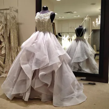 Pretty Backless Ruffles Wedding Dresses 2020 Sexy Puffy Bridal Gowns Crystal Lace Beaded Ball Gowns Vestidos De Novia 
Pretty Backless Ruffles Wedding Dresses 2020 Sexy Puffy Bridal Gowns Crystal Lace Beaded Ball Gowns Vestidos De Novia