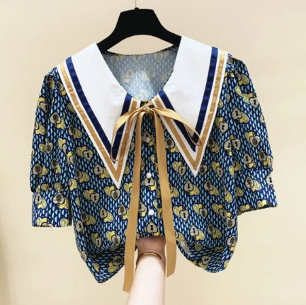 Printed Doll Collar Lace-up Bow Short Sleeve Shirt Women's 2020 Summer Top Loose All-match Blouses Blusas Office Ladies Top
Printed Doll Collar Lace-up Bow Short Sleeve Shirt Women's 2020 Summer Top Loose All-match Blouses Blusas Office Ladies Top