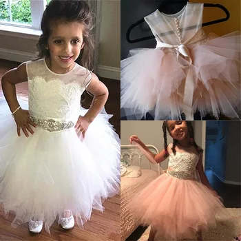 Cute Blush Short Flower Girls Dresses For Wedding Party Sheer Neck Ruffles Crystal Rhinestones Ribbon First Communion Dresses
Cute Blush Short Flower Girls Dresses For Wedding Party Sheer Neck Ruffles Crystal Rhinestones Ribbon First Communion Dresses