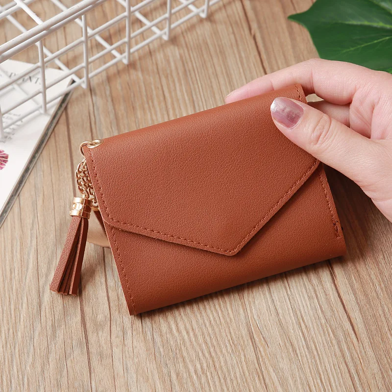 Kellybelly's new Korean version of the short Ms. Tassu wallet bag student wallet love pendant buckle bag
Kellybelly's new Korean version of the short Ms. Tassu wallet bag student wallet love pendant buckle bag