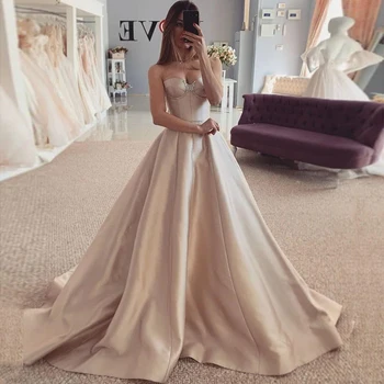 Champagne Prom Dresses 2020 Sweetheart Beading Crystal Sleeveless Satin Formal Party Evening Gown Vestidos De Fiesta Sweep Train
Champagne Prom Dresses 2020 Sweetheart Beading Crystal Sleeveless Satin Formal Party Evening Gown Vestidos De Fiesta Sweep Train