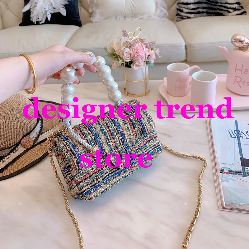 Big Pearl Woolen Chain 2019 Luxury Brand Bag Gold Handbags Bags Diamond Shoulder Crossbody Bags Woman Bags Original Designers
Big Pearl Woolen Chain 2019 Luxury Brand Bag Gold Handbags Bags Diamond Shoulder Crossbody Bags Woman Bags Original Designers