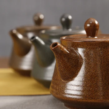 Rough pottery side pot kungfu tea set household single handle teapot small ceramic Japanese style retro ceramic tea maker 
Rough pottery side pot kungfu tea set household single handle teapot small ceramic Japanese style retro ceramic tea maker
