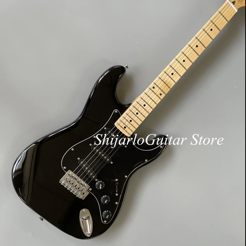 Custom st electric guitar, black body, maple fingerboard, vibrato system, chrome hardware, three pickups, free shipping
Custom st electric guitar, black body, maple fingerboard, vibrato system, chrome hardware, three pickups, free shipping