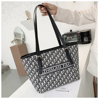 Fashion high quality ladies canvas handbag letter printing large handbag female designer luxury shopping bag travel bag 
Fashion high quality ladies canvas handbag letter printing large handbag female designer luxury shopping bag travel bag