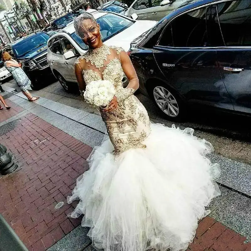 Glamorous Tiers African Plus Size Mermaid Backless Wedding Dresses Chapel Train Illusion High Neck Lace Arabic Bridal Gown
Glamorous Tiers African Plus Size Mermaid Backless Wedding Dresses Chapel Train Illusion High Neck Lace Arabic Bridal Gown
