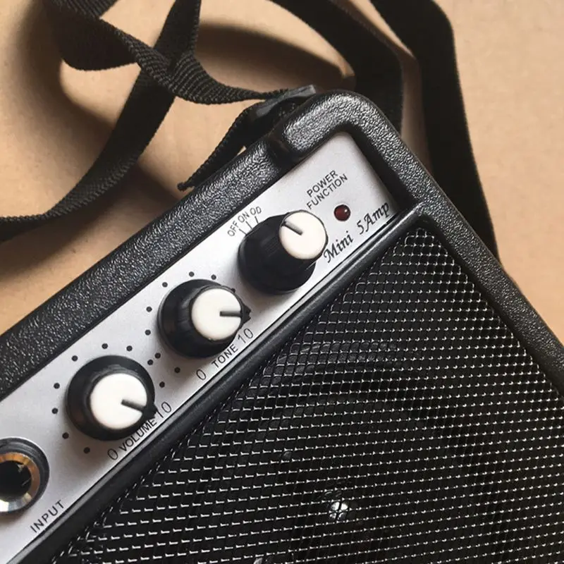 5W Electric Guitar Sound Amplifier Portable Black Speaker Belt Clip Distortion Effects Volume Adjustable DXAC
5W Electric Guitar Sound Amplifier Portable Black Speaker Belt Clip Distortion Effects Volume Adjustable DXAC
