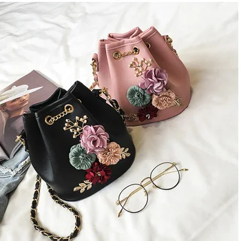 New Fashion Trend Women Handbag PU Leather Bucket Shoulder Bag Chain Flowers Crossbody Bag Female Chic Messenger Hand Bags 
New Fashion Trend Women Handbag PU Leather Bucket Shoulder Bag Chain Flowers Crossbody Bag Female Chic Messenger Hand Bags