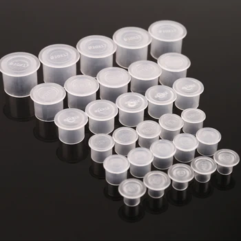 1000pcs Tattoo Ink Cups Container Plastic Transparent Small Number Permanent Makeup Pigment Caps Tattoos Ink Cup Clear Holder
1000pcs Tattoo Ink Cups Container Plastic Transparent Small Number Permanent Makeup Pigment Caps Tattoos Ink Cup Clear Holder