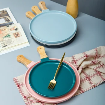 Nordic Ceramic tableware Porcelain dishes and Plate Pizza Dessert Steak Dinner Set Tableware plate with wooden handle
Nordic Ceramic tableware Porcelain dishes and Plate Pizza Dessert Steak Dinner Set Tableware plate with wooden handle