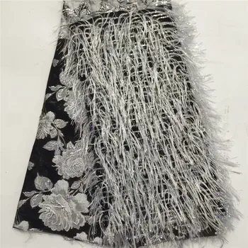 Newest Nigerian Tassels Lace Fabric With Color Sequins African Lace Fabric Soft Stretch Brocade Lace For Ghana Wedding Dress 
Newest Nigerian Tassels Lace Fabric With Color Sequins African Lace Fabric Soft Stretch Brocade Lace For Ghana Wedding Dress