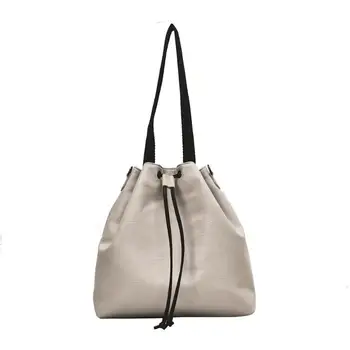Durable Drawstring Bucket Shoulder Bag Female Casual Fashion PU Leather Handbags Solid Color Large Capacity Crossbody Bags
Durable Drawstring Bucket Shoulder Bag Female Casual Fashion PU Leather Handbags Solid Color Large Capacity Crossbody Bags