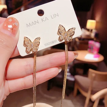 Korean version of the earring female 2020 new wave personality wild bow crystal long tassel two earrings Fashion Stud Earrings
Korean version of the earring female 2020 new wave personality wild bow crystal long tassel two earrings Fashion Stud Earrings