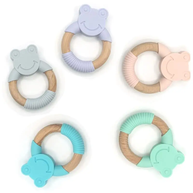 Baby Teether Animal Frog Shape Silicone Wooden Ring Nursing Accessories Chew Toy Circle Newborn Bathing Gifts
Baby Teether Animal Frog Shape Silicone Wooden Ring Nursing Accessories Chew Toy Circle Newborn Bathing Gifts