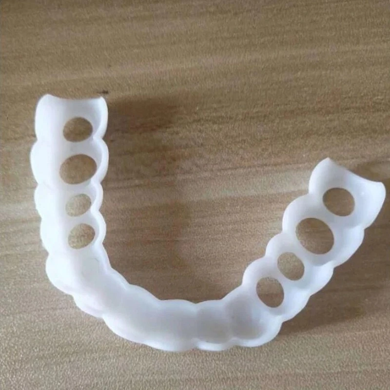 High Quality Instant Keep Smile Comfort Fit Flex Cosmetic Teeth Denture Teeth Top Cosmetic Veneer Simulation Braces Dentu
High Quality Instant Keep Smile Comfort Fit Flex Cosmetic Teeth Denture Teeth Top Cosmetic Veneer Simulation Braces Dentu