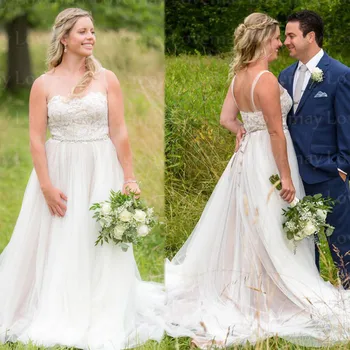 Beach Tulle Wedding Dresses 2020 A Line Scoop Spaghetti Straps Lace Appliques Beach Bride Dress Bridal Gowns Vestidos De Novia 
Beach Tulle Wedding Dresses 2020 A Line Scoop Spaghetti Straps Lace Appliques Beach Bride Dress Bridal Gowns Vestidos De Novia