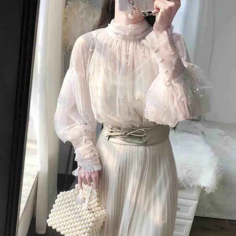 Fall Women Transparent Mesh Turtleneck Shirts Ladies Gauze Sweet Pearls Blouses Beads Long Sleeve Shirts Plus Size 
Fall Women Transparent Mesh Turtleneck Shirts Ladies Gauze Sweet Pearls Blouses Beads Long Sleeve Shirts Plus Size