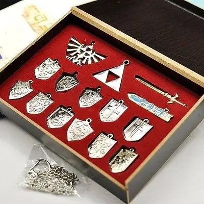 14 Pcs The Legend of Zelda Shield Skyward Sword Blade Weapons Pendants Chain keychains Necklace Set Silver Color with Retail Box
14 Pcs The Legend of Zelda Shield Skyward Sword Blade Weapons Pendants Chain keychains Necklace Set Silver Color with Retail Box