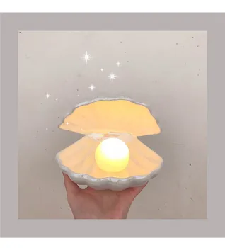 Ins Ceramic Shell with Pearl Night Light Streamer Mermaid Light Fairy Shell Night Lamp for Bedside Home Decor Holiday Gift
Ins Ceramic Shell with Pearl Night Light Streamer Mermaid Light Fairy Shell Night Lamp for Bedside Home Decor Holiday Gift