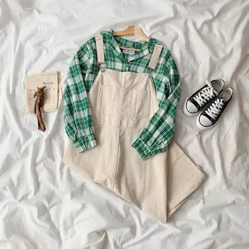 Set female autumn 2019 new Korean students loose green plaid shirt + versatile strap skirt two-piece
Set female autumn 2019 new Korean students loose green plaid shirt + versatile strap skirt two-piece