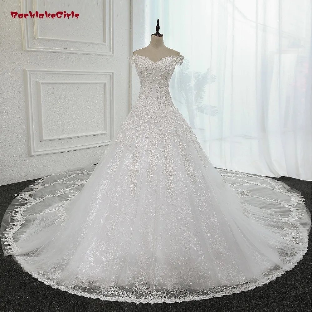 Hot Wedding Dresses Cathedral Tail A Line V Neck Floor Length Luxury See through Back Bridal Gowns China vestido de noiva
Hot Wedding Dresses Cathedral Tail A Line V Neck Floor Length Luxury See through Back Bridal Gowns China vestido de noiva