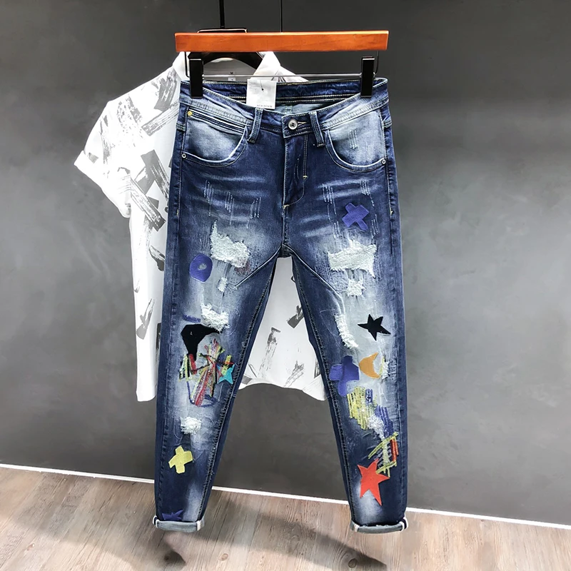 Newly Designer Fashion Men Jeans Patches Embroidery Slim Fit Ripped Jeans Men Elastic Punk Pencil Pants Streetwear Hip Hop Jeans
Newly Designer Fashion Men Jeans Patches Embroidery Slim Fit Ripped Jeans Men Elastic Punk Pencil Pants Streetwear Hip Hop Jeans