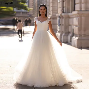 Thinyfull Princess Wedding Dresses Beach Lace Appliques Illusion A-Line Mariage Dress Backless Bridal Gowns For Women Plus Size
Thinyfull Princess Wedding Dresses Beach Lace Appliques Illusion A-Line Mariage Dress Backless Bridal Gowns For Women Plus Size