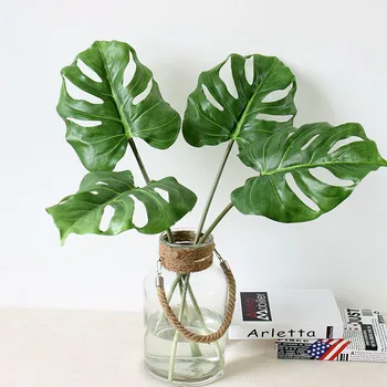 Coating Plastic Artificial Big Palm Tree Leaves Real Touch Monstera Leaf Fake Plants for Home Garden Wedding Decoration 
Coating Plastic Artificial Big Palm Tree Leaves Real Touch Monstera Leaf Fake Plants for Home Garden Wedding Decoration
