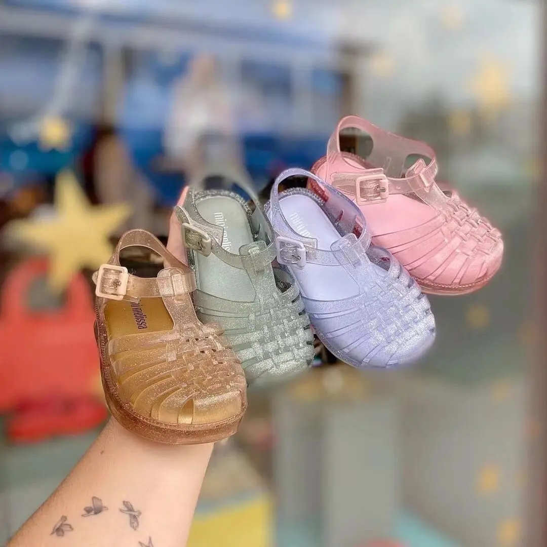Mini Melissa 2022 Girl's Roma Jelly Sandals Princess Sparkle Fashion Jelly Shoes Kids Candy color Beach wear for Children HMI043
Mini Melissa 2022 Girl's Roma Jelly Sandals Princess Sparkle Fashion Jelly Shoes Kids Candy color Beach wear for Children HMI043