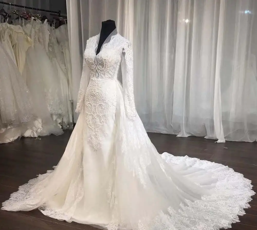 Luxury Long Sleeve Lace V-Neck Beaded Wedding Dresses with Over Skirt A-Line Tulle Sweep Train Bridal Gowns for Women Real Photo
Luxury Long Sleeve Lace V-Neck Beaded Wedding Dresses with Over Skirt A-Line Tulle Sweep Train Bridal Gowns for Women Real Photo