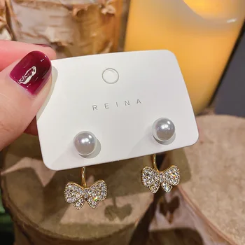 925 Silver Man-made Diamond Compact Bow Pearl Earring Female South Korea Versatile a Two Wear Earrings Ear Stud Wholesale
925 Silver Man-made Diamond Compact Bow Pearl Earring Female South Korea Versatile a Two Wear Earrings Ear Stud Wholesale