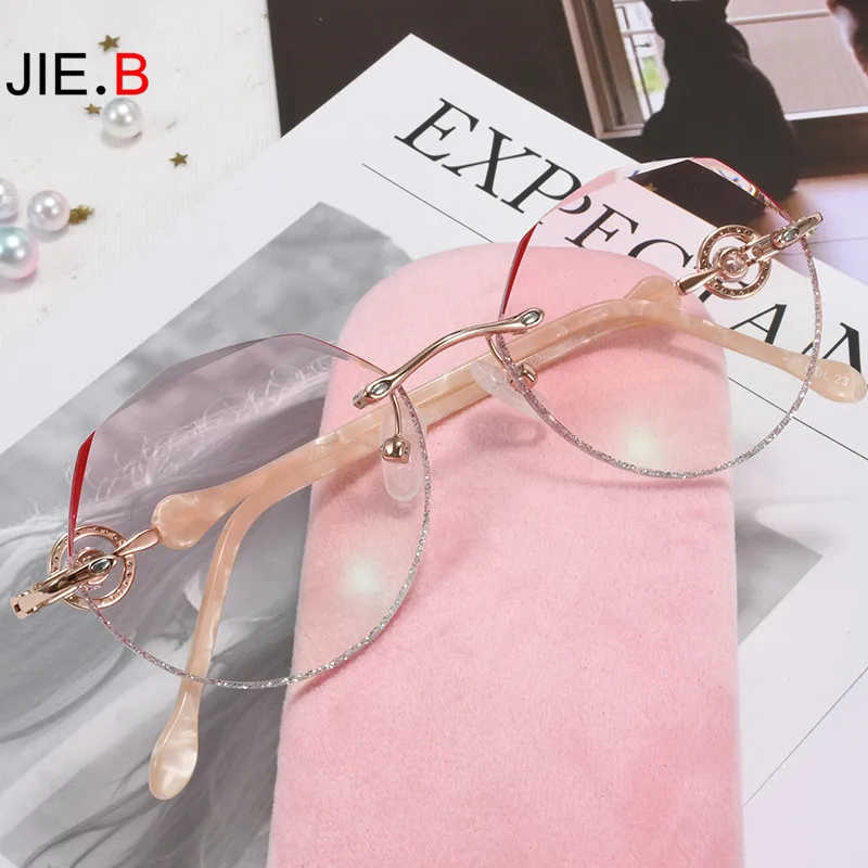 JIE.B Rhinestone Titanium Alloy Frame Transparent Lens Rimless Glasses Light Frame Ladies Gradient Color Prescription Glasses
JIE.B Rhinestone Titanium Alloy Frame Transparent Lens Rimless Glasses Light Frame Ladies Gradient Color Prescription Glasses